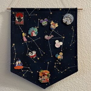 12 Official Disney Pins on Hanging Pennant